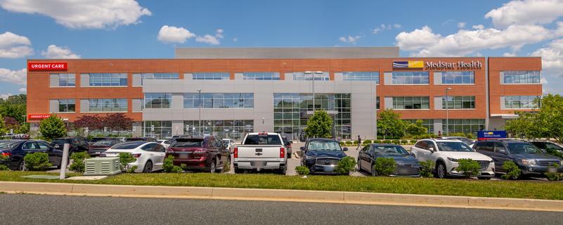 MedStar Health at Bel Air is a modern brick and glass building with a large parking lot.
