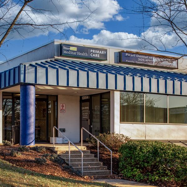 MedStar Health Primary Care in Laurel at Baltimore Avenue is located in a one-story office building with a blue metal roof.