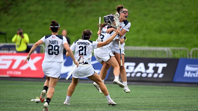 Lacrosse athletes celebrate together at the World Lacrosse Championship held in Baltimore in 2022.