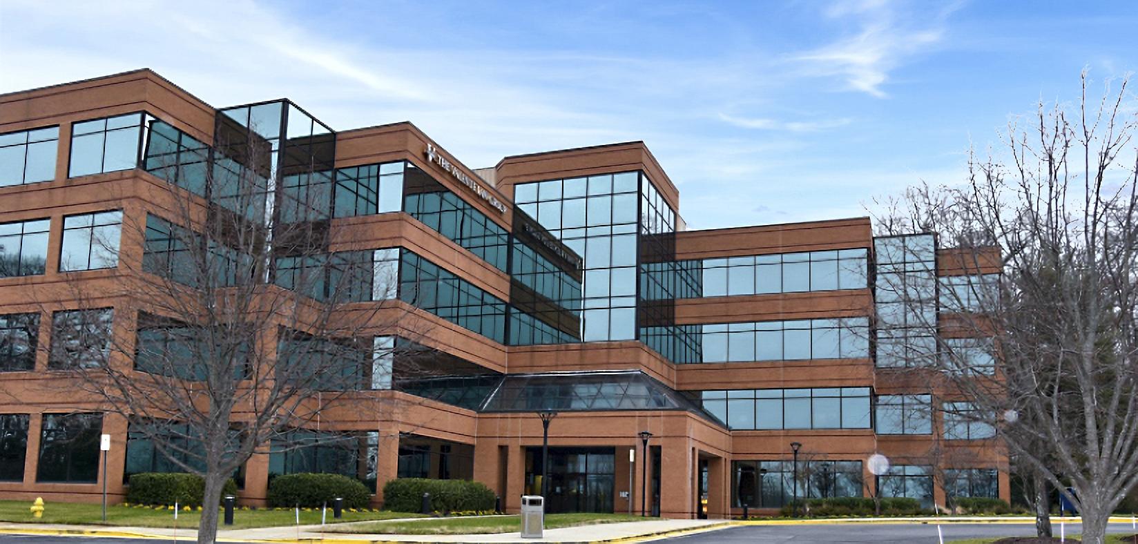 Shah Medical Group at Crofton Medical Center is located in a modern brick and glass building.