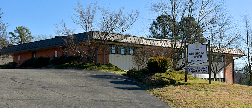 A 2-story brick and concrete building is where MedStar Health Shah Medical Group at St Mary's Medical Arts Building is located. 