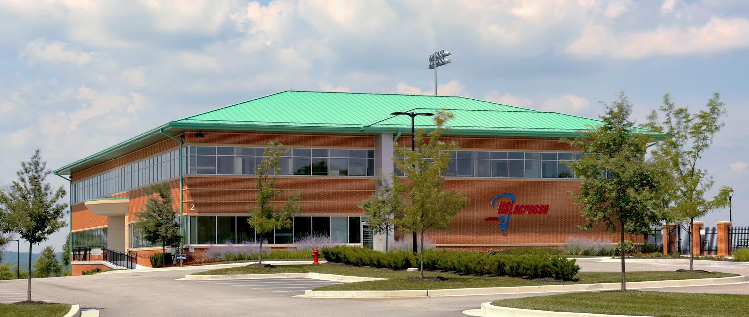 Brick building with a green roof at 2 Loveton Circle, Sparks, MD, where MedStar sports medicine and orthopedics is located.