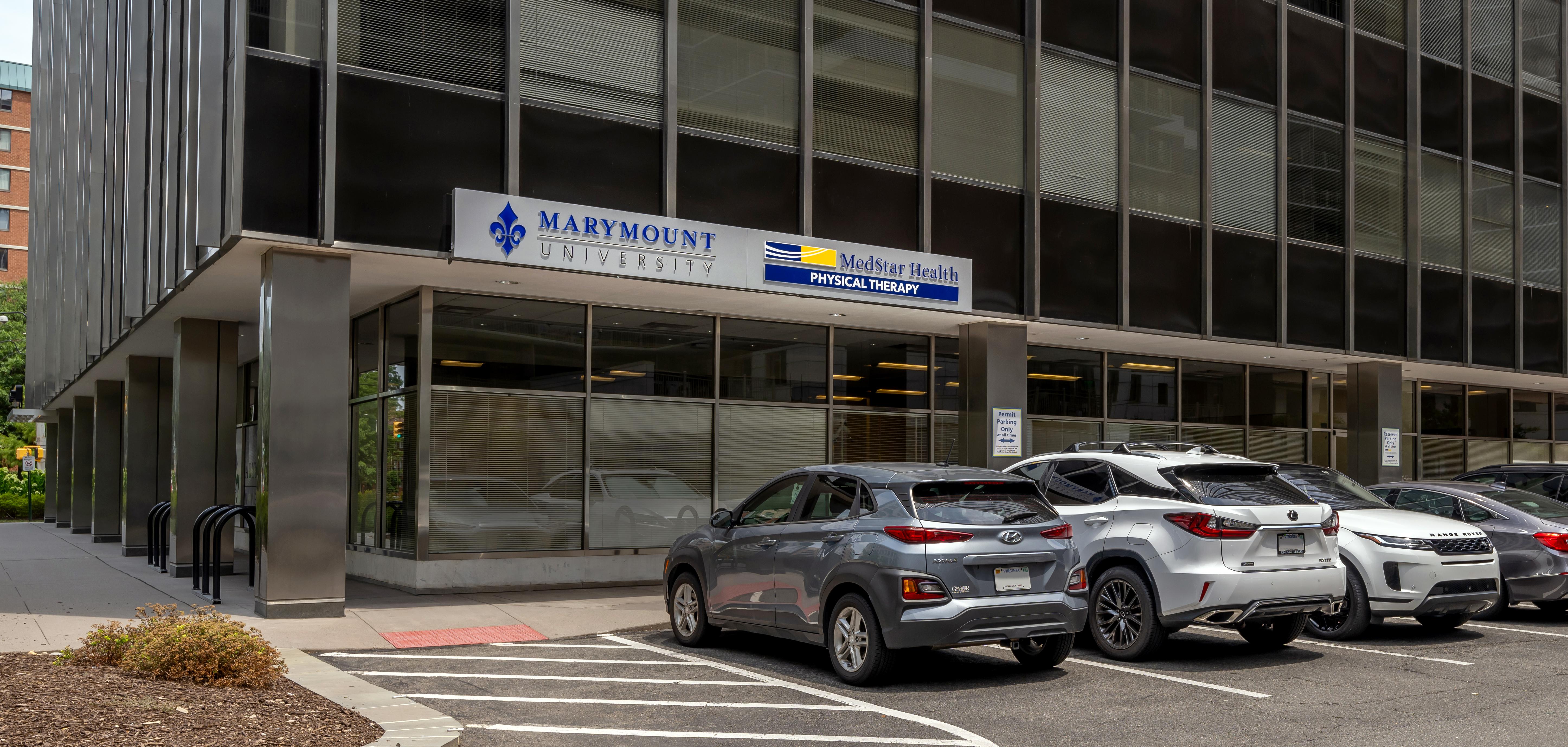 A modern black office building is the location of MedStar Health Physical Therapy at Ballston-Marymount.