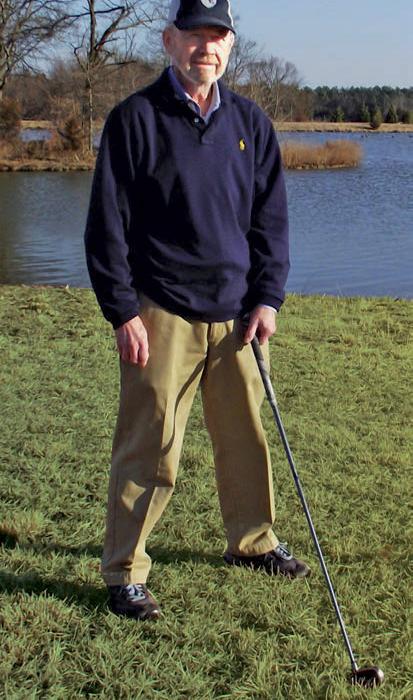 Jack Yeatts poses for a photo on the golf course, after undergoing successful proton therapy at MedStar Georgetown University Hospital.