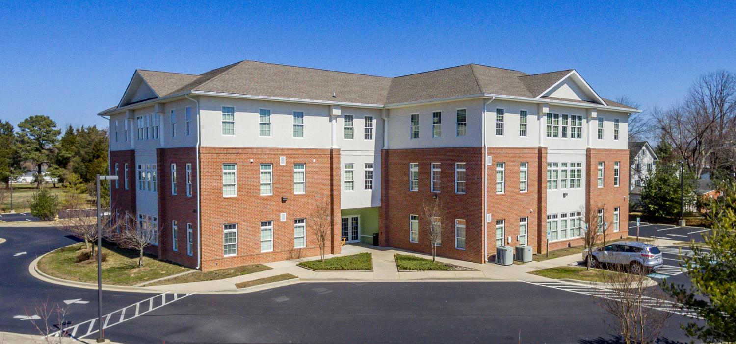 A white and brick professional building is the location for MedStar Primary Care at St Mary's