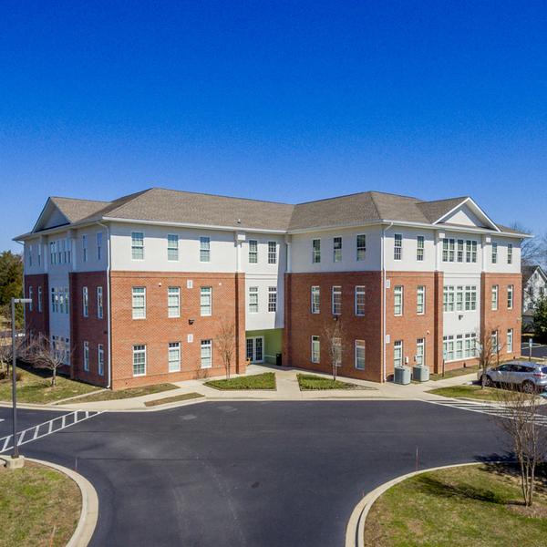 A white and brick professional building is the location for MedStar Primary Care at St Mary's