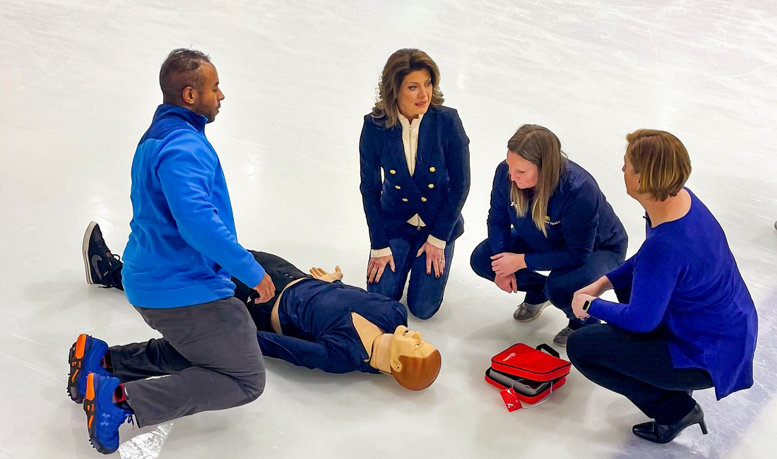 Screenshot from a CBS News broadcast with Norah O'Donnell where MedStar Health physician Korin Hudson shows what to do in a case of sudden cardiac arrest in an athlete.