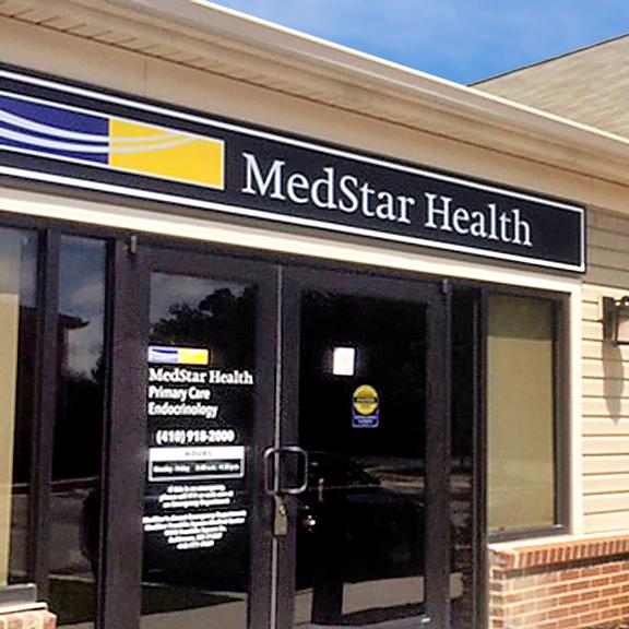 MedStar Health Primary Care at Ridge Road is a one-story building with yellow siding.