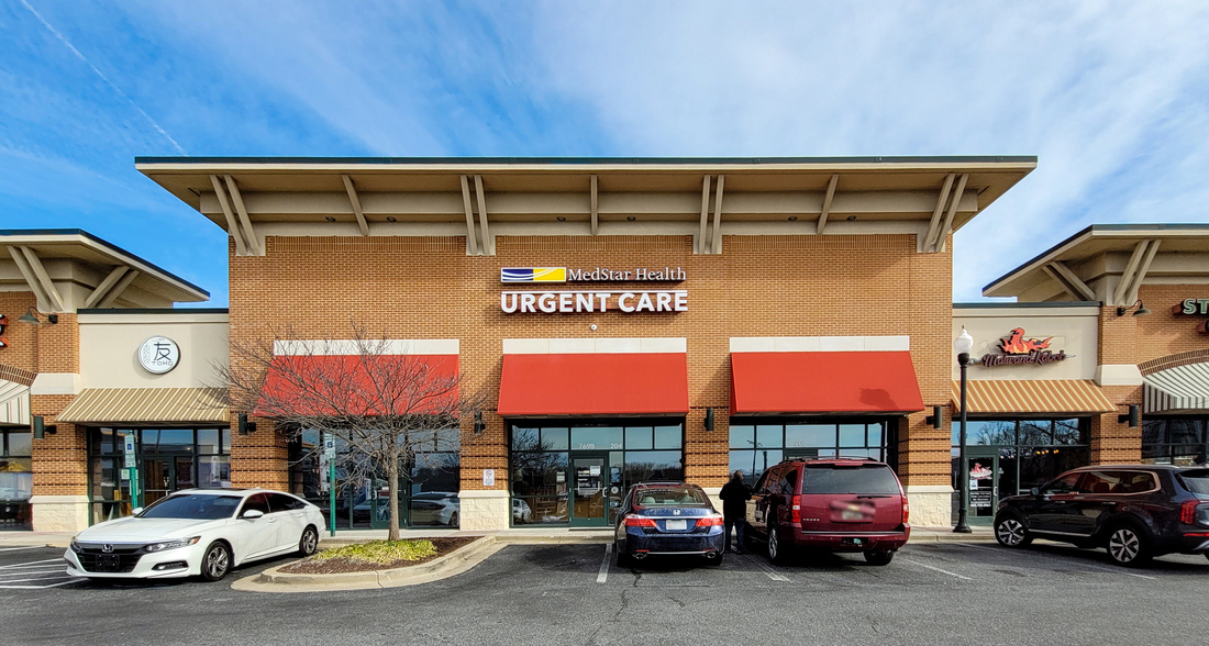 MedStar Health Urgent Care at Arundel Mills is in a shopping center and has a red awning.