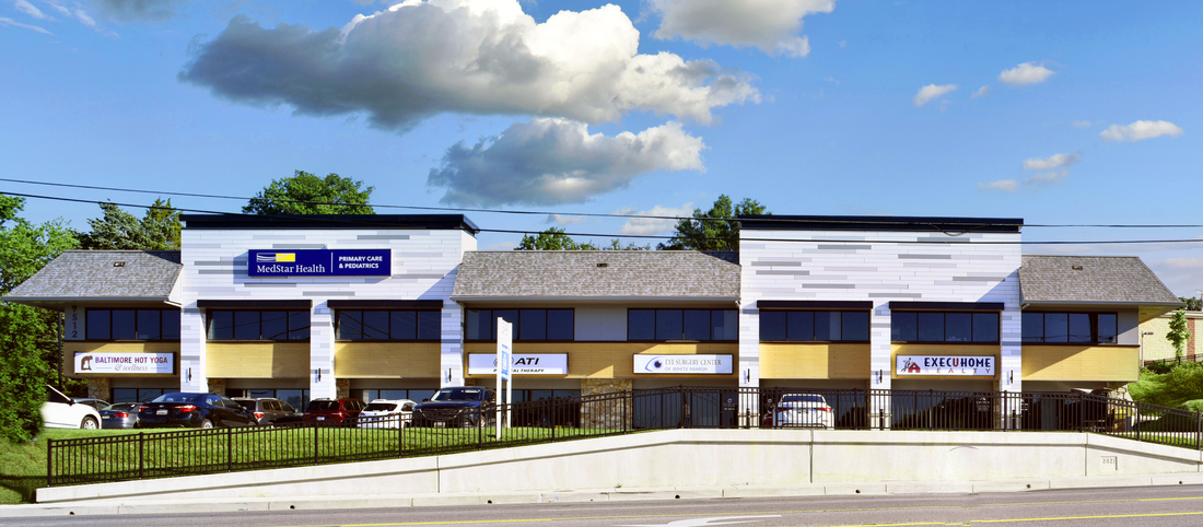 MedStar Health Primary Care at Parkville is located in a green and stone building.