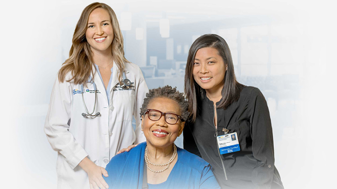 A MedStar doctor and nurse who work in bloodless medicine pose for a photo with a female patient.