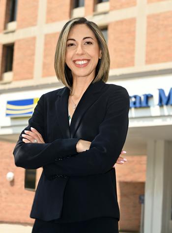 Emily Briton, newly appointed president of MedStar Montgomery Medical Center, poses for a portrait in front of the hospital. 