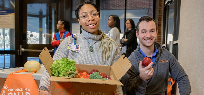 Community Health Advocates help with the Hungry Harvest program at MedStar Health.