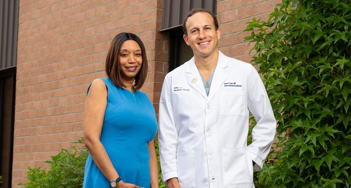 Dr Brian Case stands with patient LaShon Bernett at MedStar Southern Maryland Hospital Center.