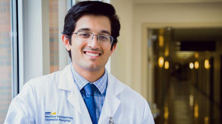 Dr Manas Nigam poses for a portrait in a hallway at MedStar Georgetown University Hospital
