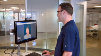 Dr Ethan Booker conducts a telehealth visit with a patient at MedStar Health.