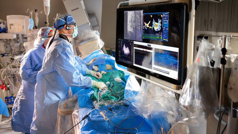 Dr Glenn Meininger performs a surgical procedure in the cardiac catheterization lab at MedStar Health.