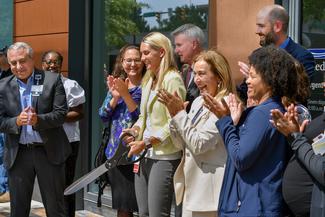 Dr Bronson Delasobera cuts the ribbon in a ceremony at the new MedStar Health Urgent Care location at Ballston, in Alexandria, VA on Monday September 11, 2023.