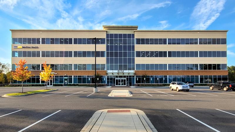 MedStar Health Primary Care at Annapolis is located in a brick, concrete and glass building with a blue awning.