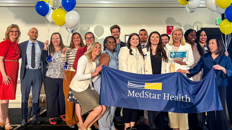 The team from MedStar Health celebrates after being recognized with the first Well-Being Excellence™ credential awarded by the prestigious American Nurses Credentialing Center (ANCC).