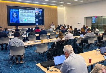 Participants listen to presentations during the Universal “AI for Health” Summit