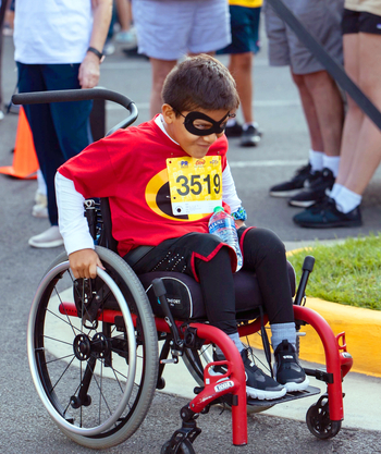Athletes participate in the annual Super H 5K Run, Walk & Wheel community event.