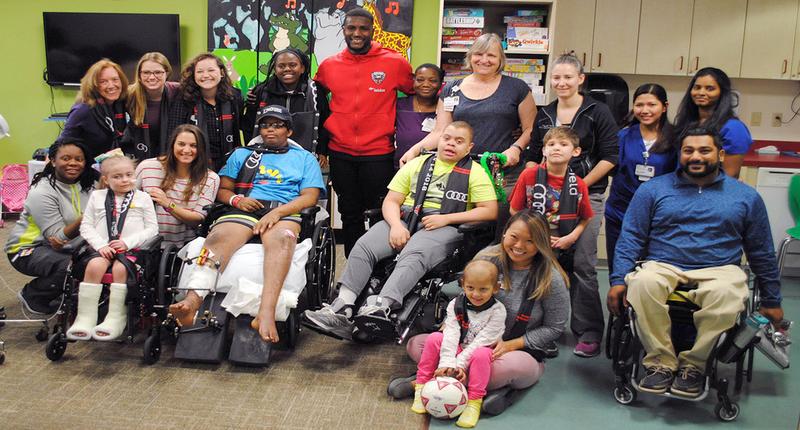 DC United goalkeeper Bill Hamid pays a visit to pediatric patients at MedStar National Rehabilitation Hospital.