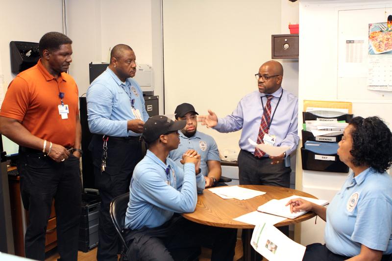 A team of security guards in a meeting at MedStar Health.