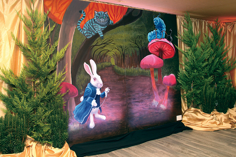 An “Alice in Wonderland”-style mural, illustrated by graphic arts students at Dr. James A. Forrest Career and Technology Center, completed the Rabbit Hole Lounge motif at the 2018 Gala.