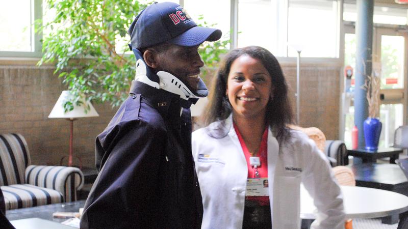 Injured firefighter Dane Smothers in the rehabilitation gym at MedStar Health.