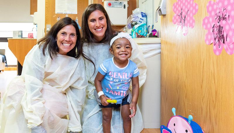 Amanda Zuckerman and Laurie Strongin deliver homey decor items to furnish extended stay hospital rooms at MedStar Georgetown University Hospital. 