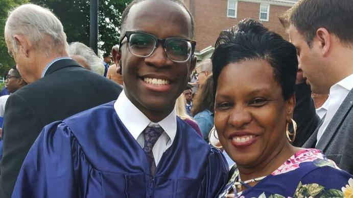 Austin Williams with his mother at his high school graduation.
