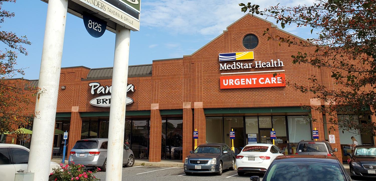 Shopping center entrance to MedStar Health urgent care center in Pasadena, Maryland