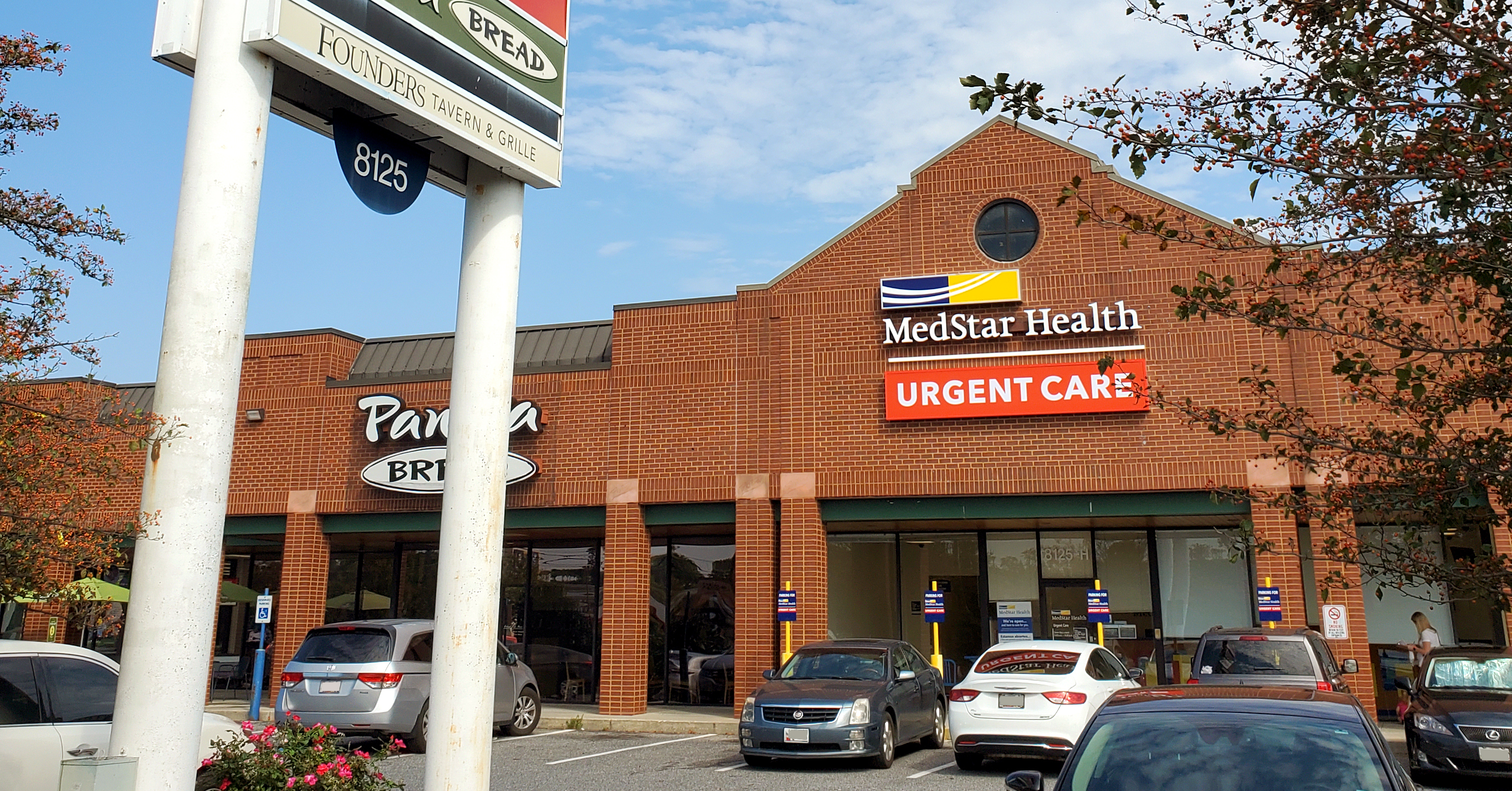 Shopping center entrance to MedStar Health urgent care center in Pasadena, Maryland