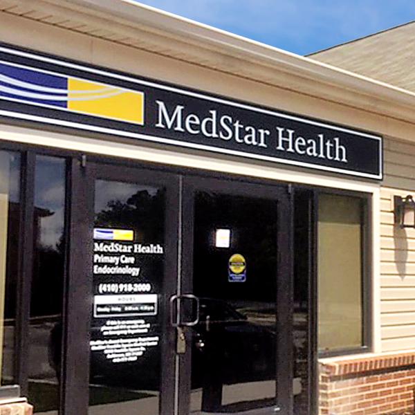 MedStar Health Primary Care at Ridge Road is a one-story building with yellow siding.