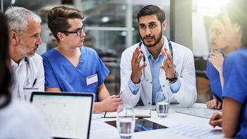 A group of diverse healthcare professionals in a meeting