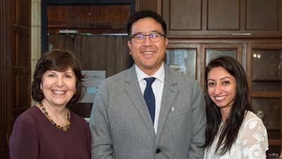 Doctors Mayada Akil, Ted Liao and Shaheja Bandealy stand together and pose for a team photo.