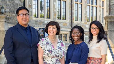 Doctors Mayada Akil, Ted Liao and Shaheja Bandealy stand together and pose for a team photo.