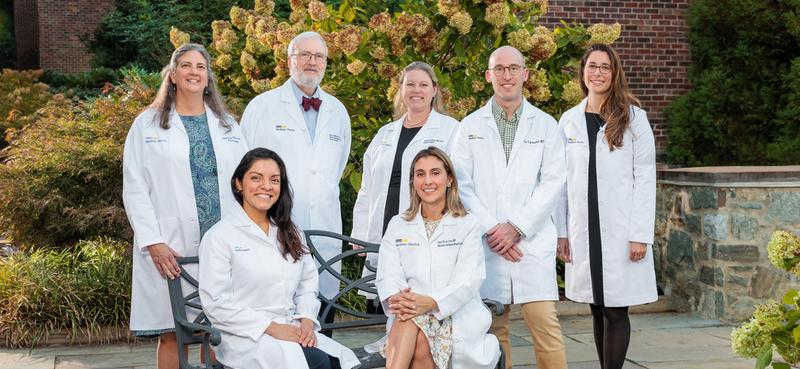 A team of physicians from MedStar Georgetown University Hospital's breast oncology program pose for a photo.