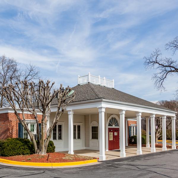 MedStar Primary Care at Olney Professional Park is located in a quaint 1-story brick building with white columns.