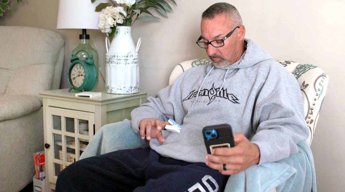 Andrew Sarmast, a patient at MedStar Health, uses a device that monitors his blood oxygen level remotely, and sends the information to his doctor.