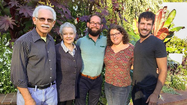 Debbie Koss poses for a photo with her family outdoors, after undergoing successful treatment for breast cancer at MedStar Health.