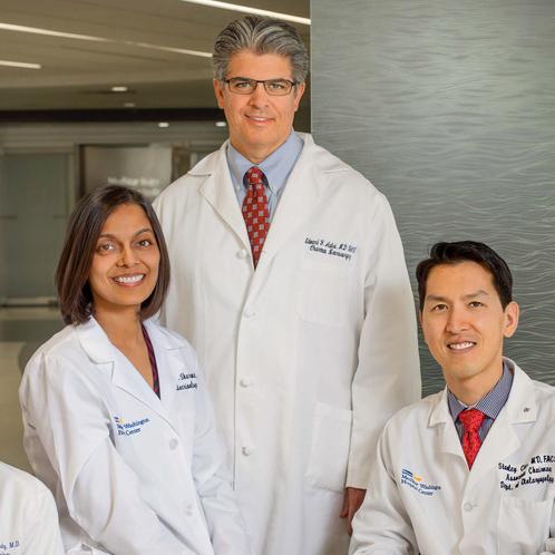 A group of 5 doctors from the MedStar Health Pituitary specialty group pose for a photo in the lobby of MedStar Washington Hospital Center.