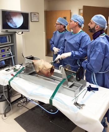 Three doctors perform a training exercise at MedStar Health.