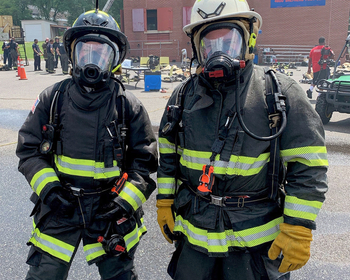 Residents dressed in full firefighting gear.