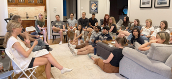 Residents meet for a journaling club.