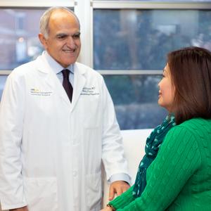 Dr Nadim Haddad talks with a patient during an office visit at MedStar Georgetown University Hospital.