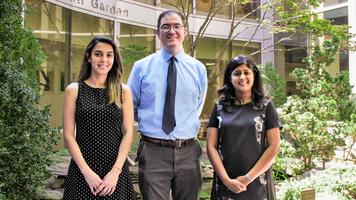 Current fellows in the MedStar Health Infectious Disease Fellowship Program stand together in a garden.