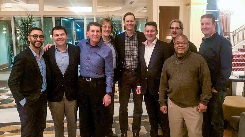 Former fellows Dr. Vishal Mehta and Dr. Ralph Vick (left to right) with the Baltimore Ravens medical staff at the 2018 NFL Combine.