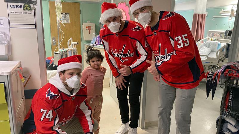 Washington Capitals players pay a visit to a young patient at a MedStar Health Hospital.